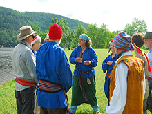 Brooke hands out tobacco for the tobacco ceremony 