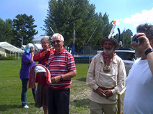 Father Marc was given a t-shirt and a sash on behalf of the West Wind Brigade 